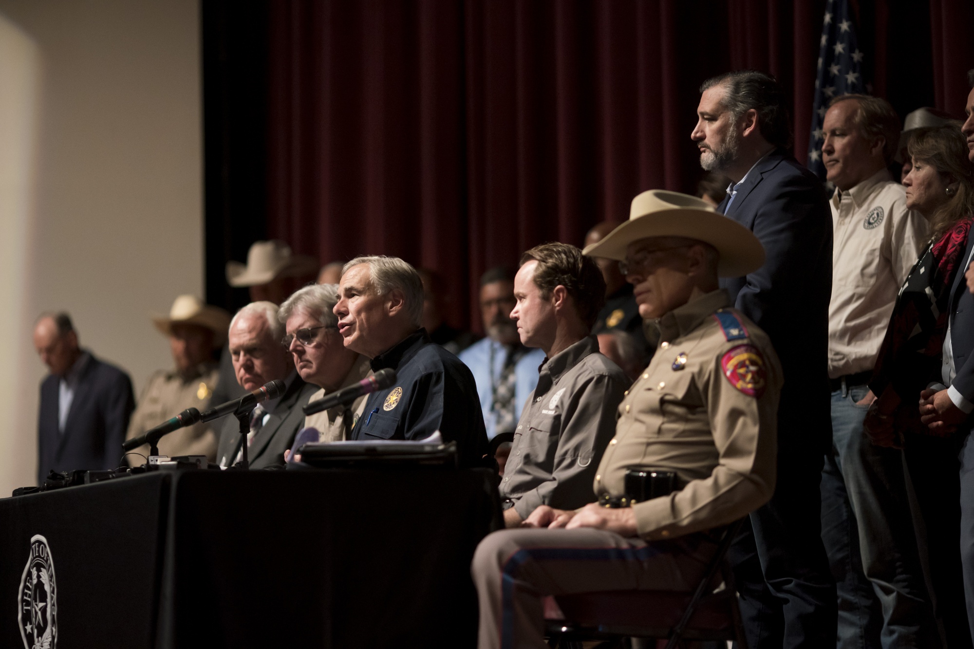 Greg Abbott, Republican governor of Texas, center, at a news conference in Uvalde, Texas, surrounded by Texas police officials on May 25