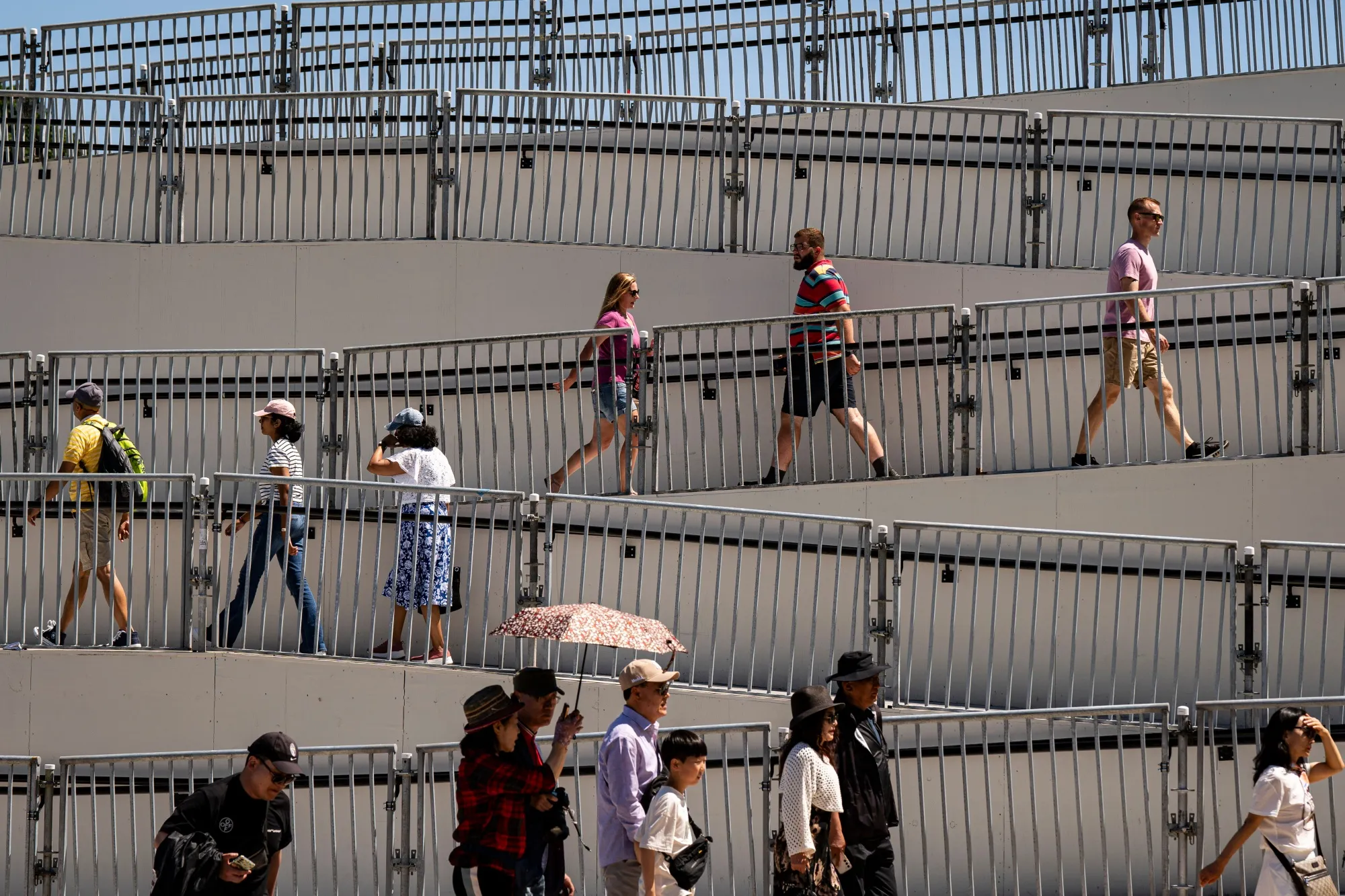 Pedestrians at the Lincoln Memorial during renovations in Washington.