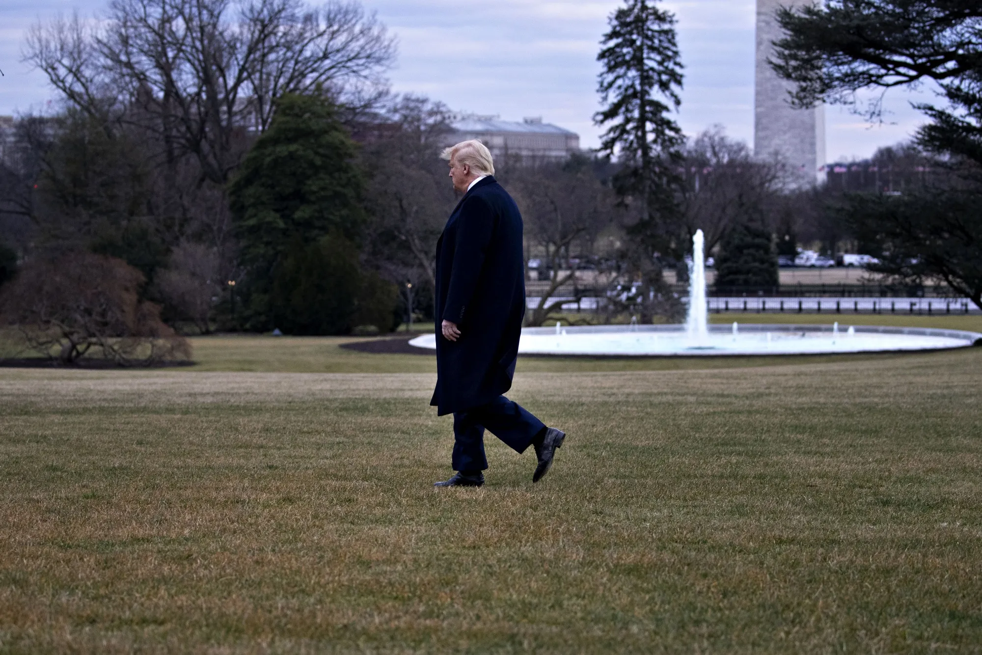 President Donald Trump walks on the South Lawn of the White House before boarding Marine One in Washington, D.C., on Jan. 28, 2020.\