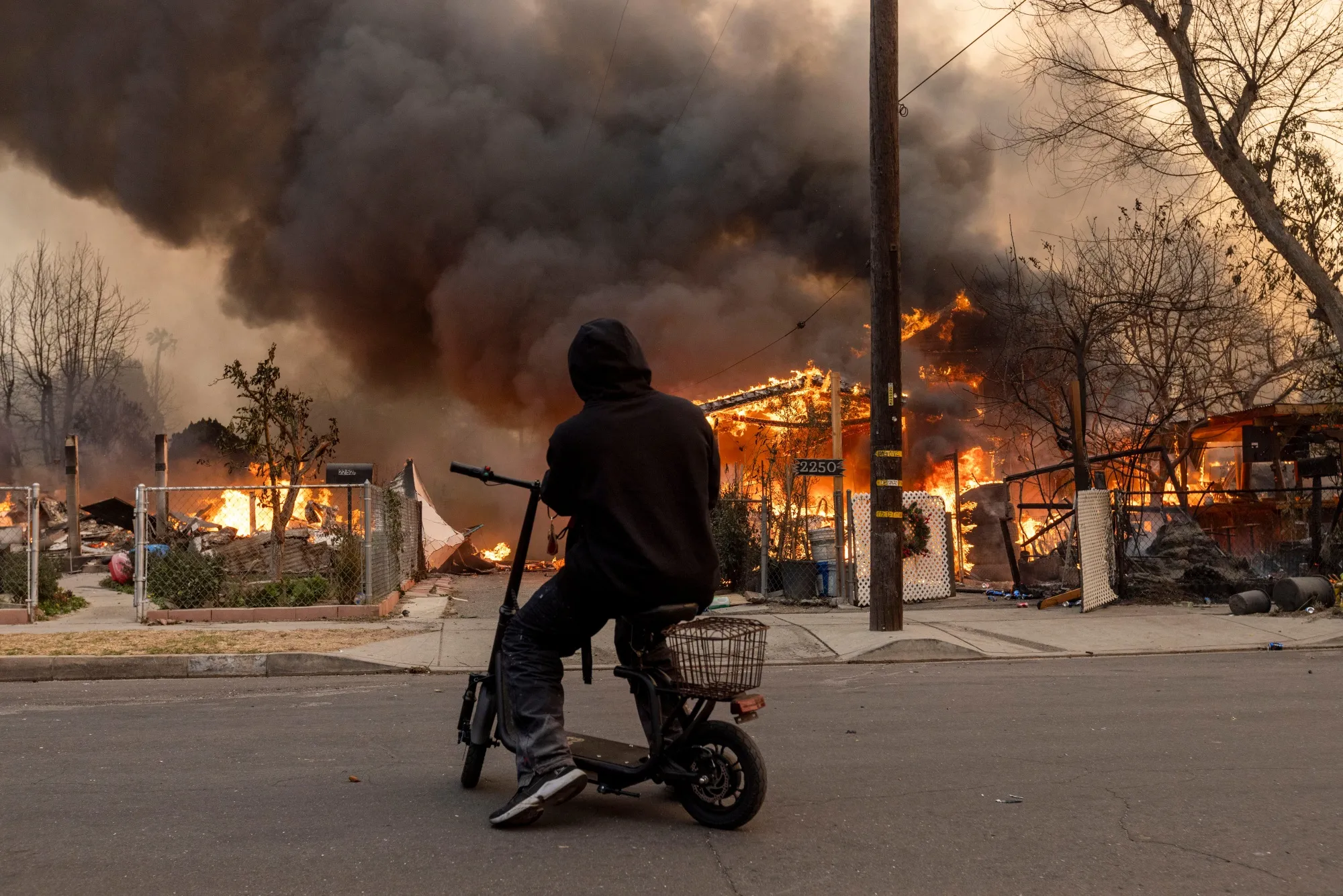 Homes burn during the Eaton Fire in Altadena on Jan. 8. 