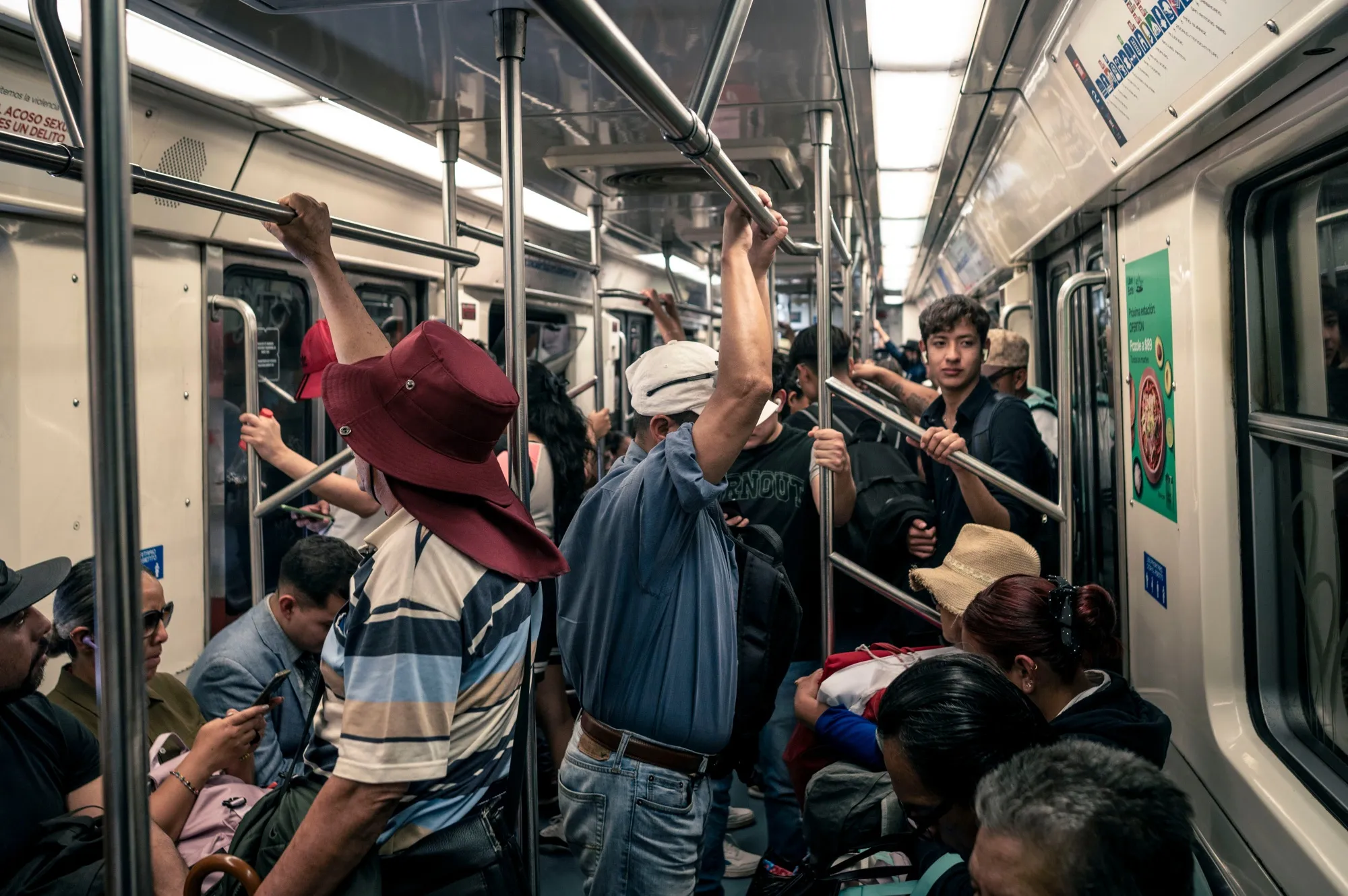 Commuters on the subway in Mexico City.