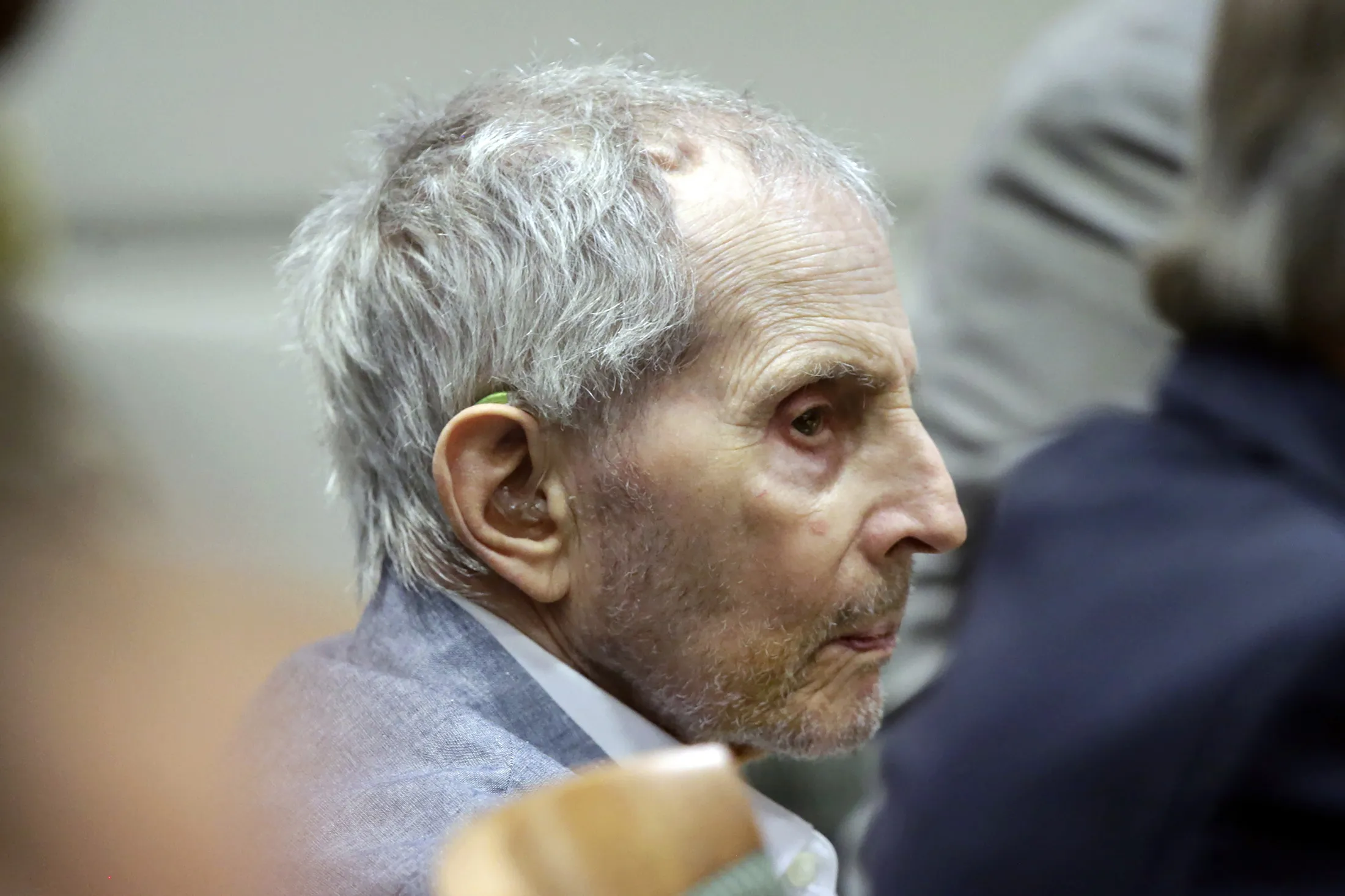 Robert Durst listens during his trial in Los Angeles on March 10.