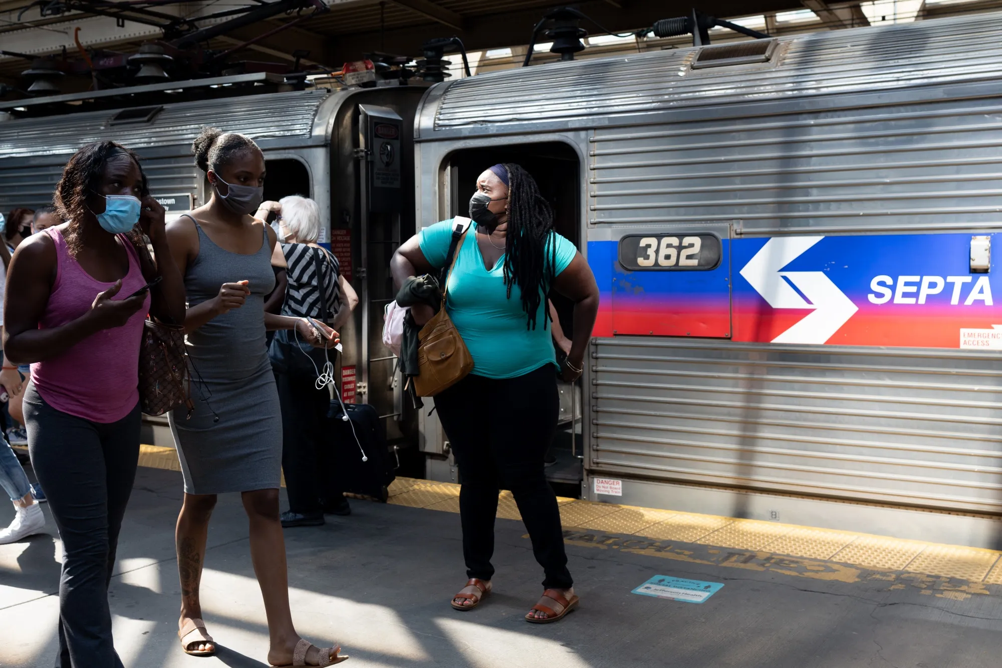 
Passengers exit a SEPTA train at a commuter rail station in Philadelphia, Pennsylvania, on Friday, July 30, 2021.&nbsp;
