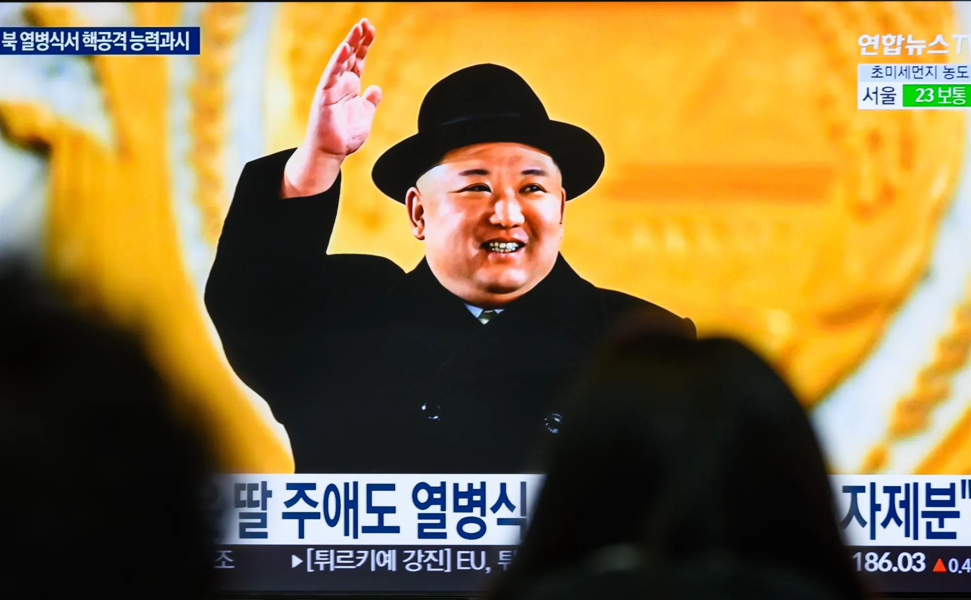 A news broadcast with an image of North Korean leader Kim Jong-un attending a military parade held in Pyongyang, at Yongsan railway station in Seoul.&nbsp;