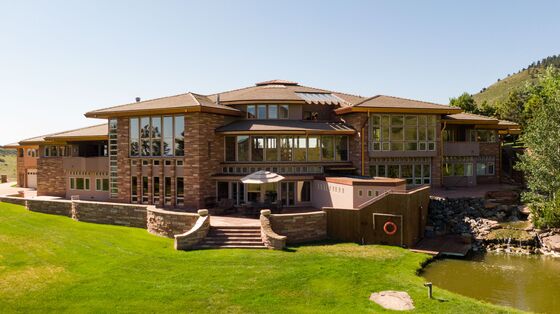 The Mansion That Chunky Monkey Built Has a Pool in the Foyer