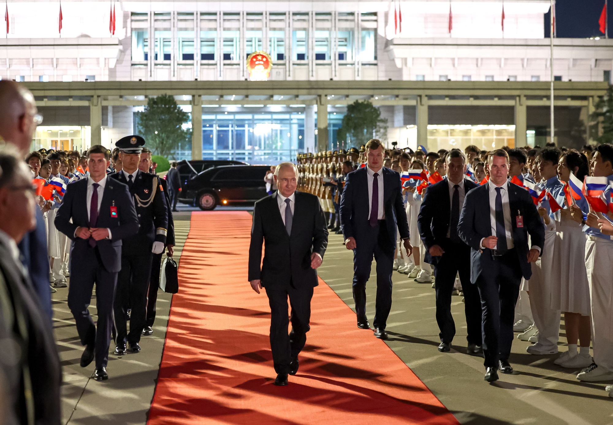 Russia's President Vladimir Putin departs Beijing on May 20, in this pool photo supplied by Russian state media. Photographer: Alexander Kazakov/Pool/AFP/Getty Images