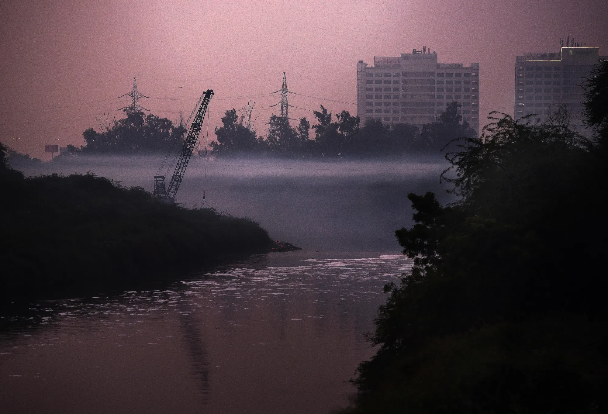 Thick layer of smoke freeze on the drain in New Delhi on Nov. 8.