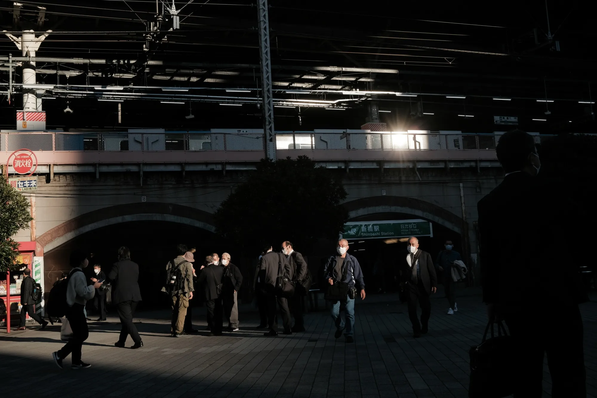 Commuters near Shimbashi station in Tokyo.