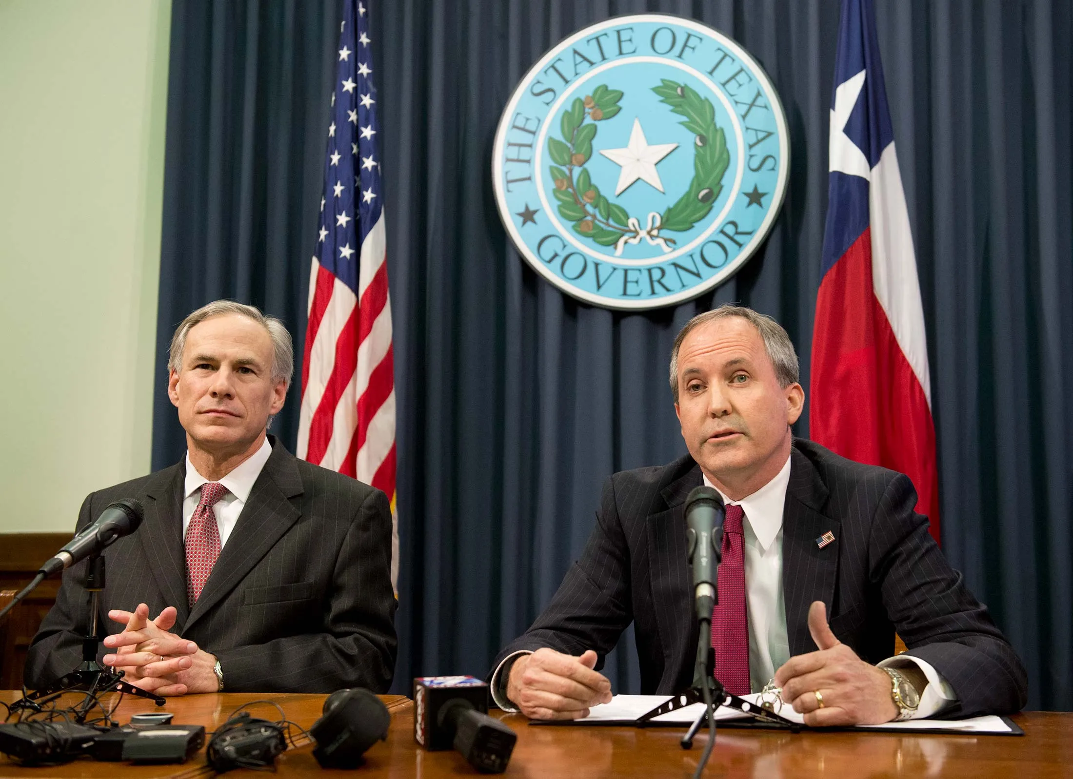 Texas Governor&nbsp;Greg Abbott (left) and Attorney General Ken Paxton.