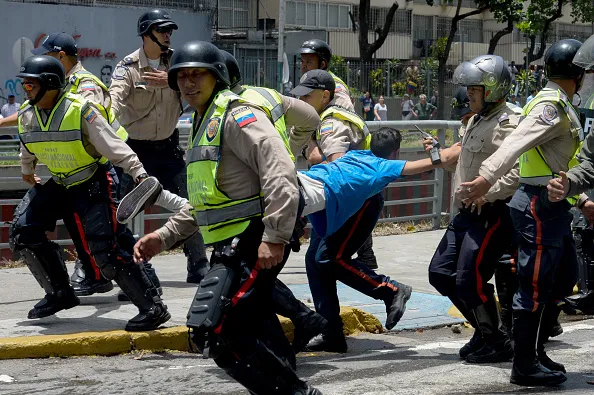 Ten policemen vs. one man, one vote.
