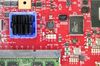 Components are displayed on a circuit board at the Qualcomm Inc. booth at the Mobile World Congress Shanghai in Shanghai, China, on Thursday, June 28, 2018. The exhibition runs through June 29.