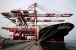 A cargo ship berths at a port in Qingdao, east China's Shandong province on March 8, 2016. China's exports saw their heaviest fall in nearly seven years in February, diving more than a quarter as feeble global trade offset the weaker yuan and raised pressure on Beijing to ramp up domestic demand as a driver of expansion. / AFP / STR / China OUT (Photo credit should read STR/AFP/Getty Images)
