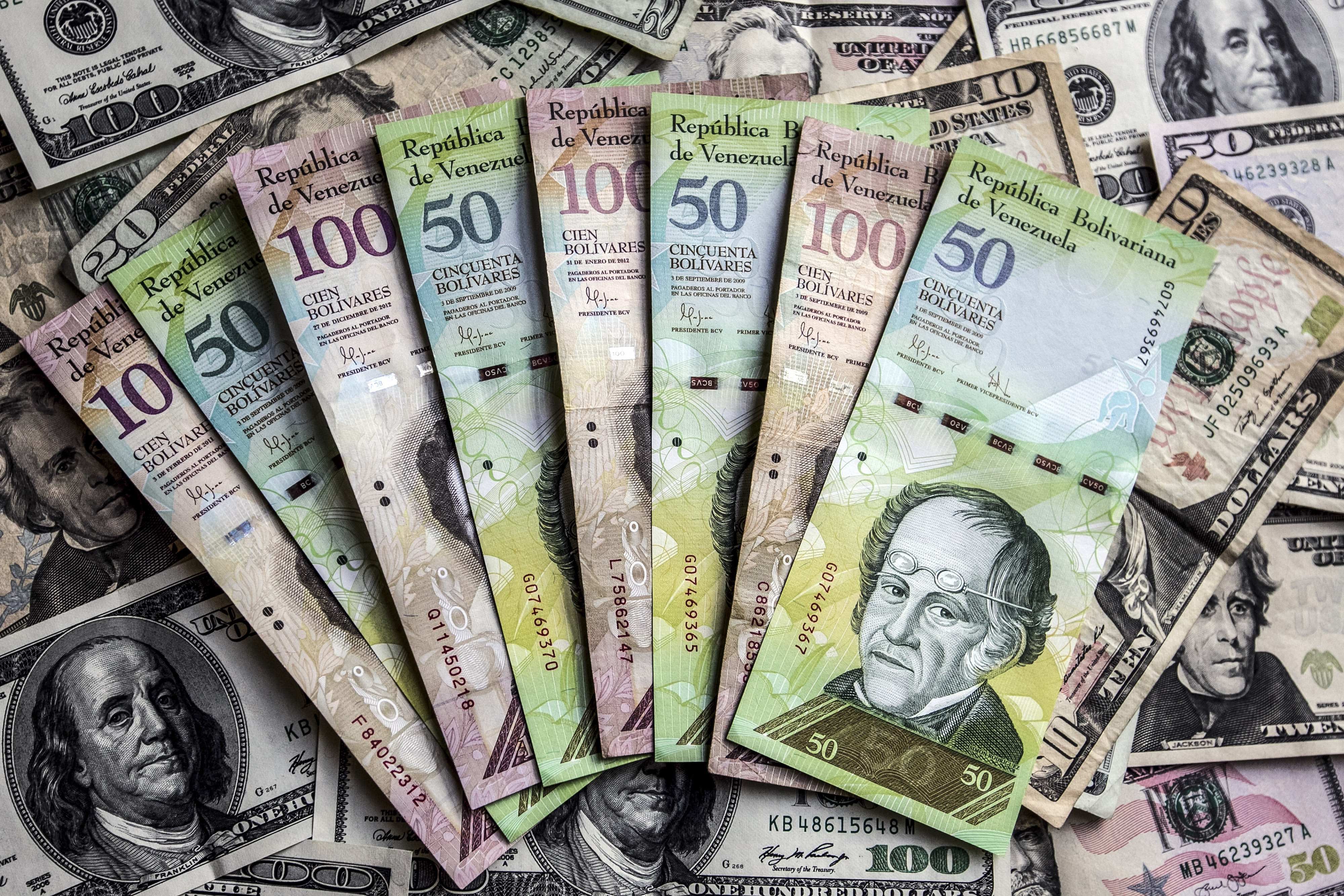 Currency Illustrations As Bolivar Weakens Against the Dollar