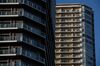 Residential buildings stand in the Kachidoki area of Tokyo, Japan, on Tuesday, Feb. 21, 2017. Evidence is mounting that Tokyo's housing boom is nearing an end as the number of unsold new apartments in the city reached the highest in seven years in 2016.
