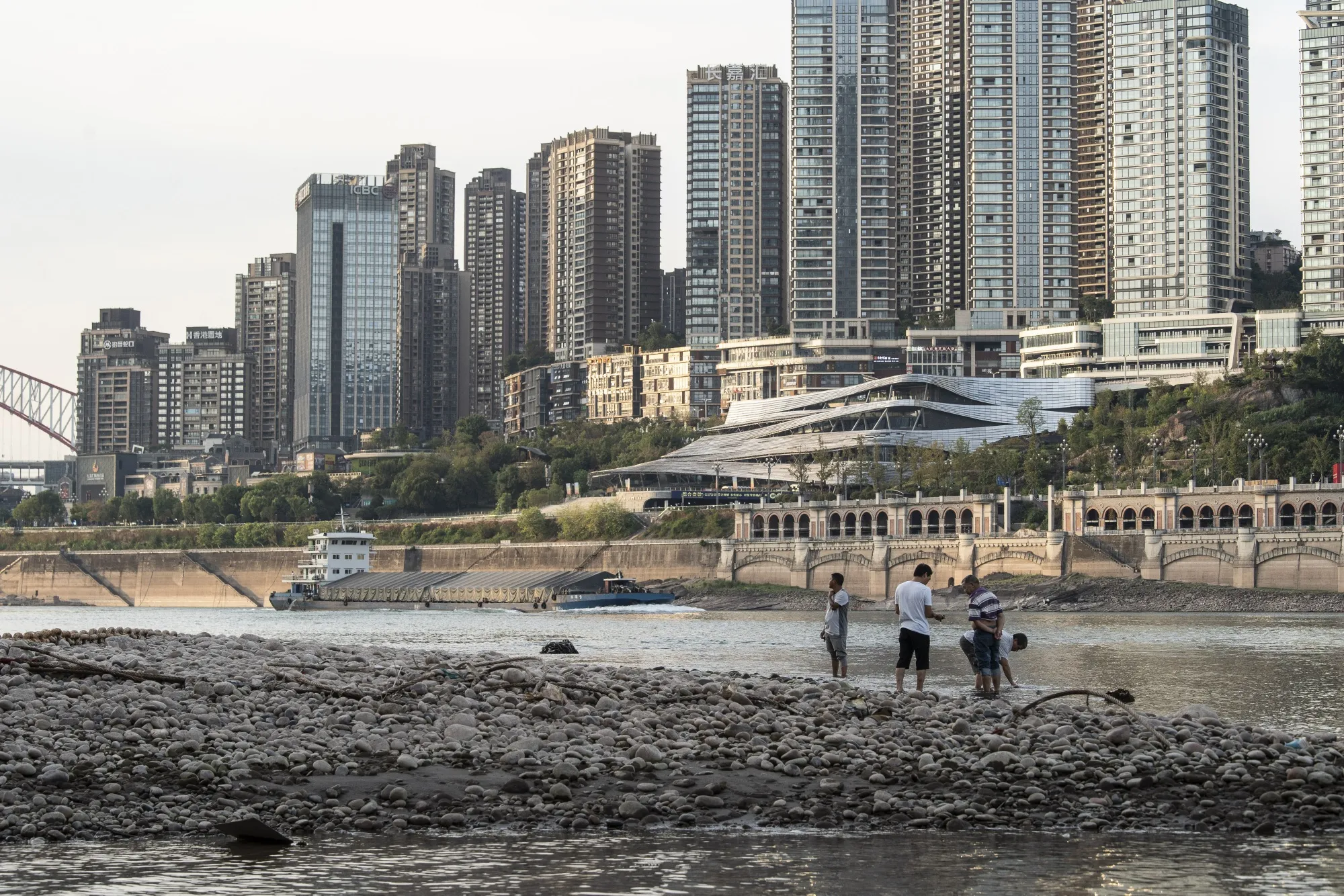 People near the shallow banks of Yangtze River, due to low water levels caused by drought, in Chongqing in 2022.