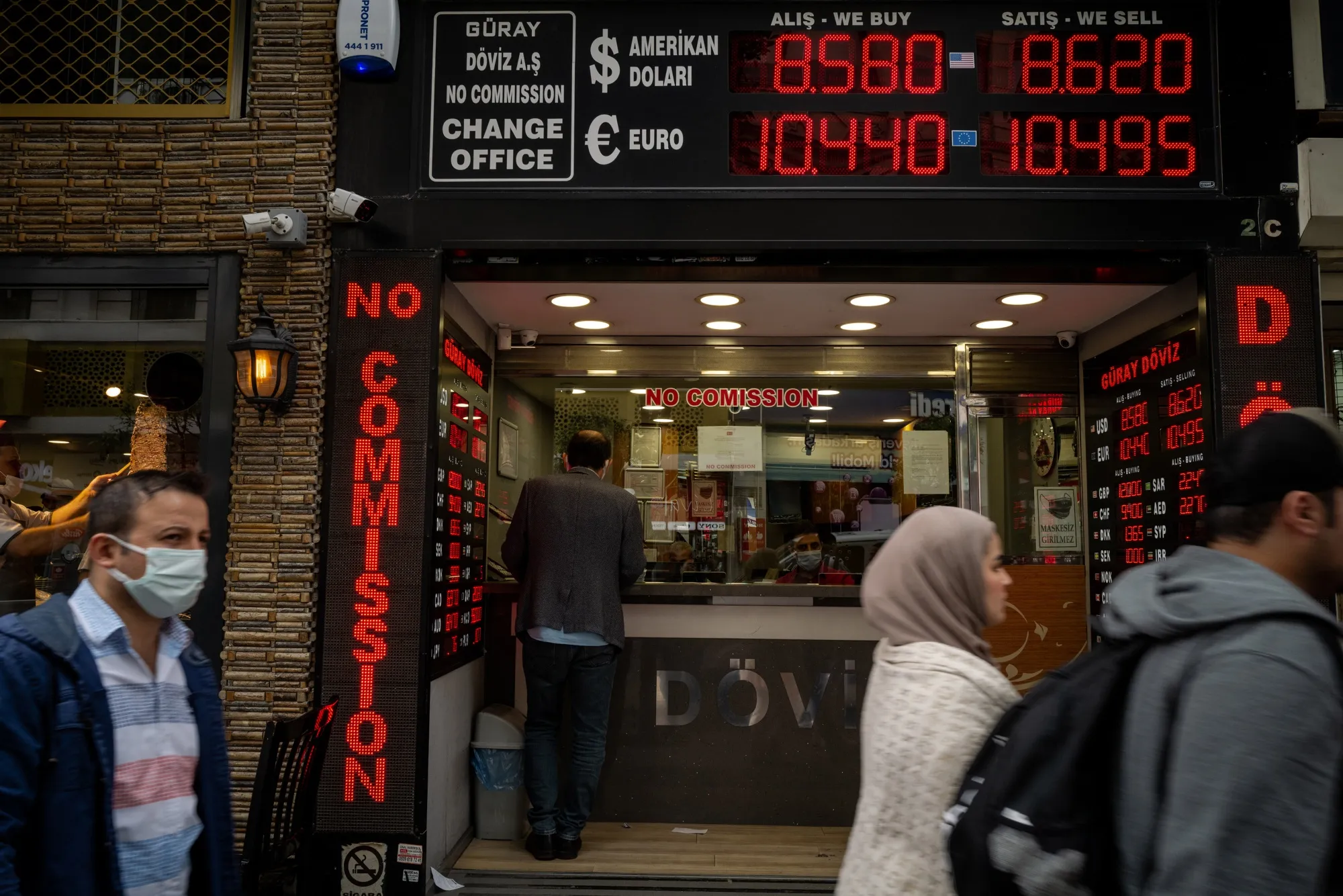 A customer uses a currency exchange bureau in Istanbul, Turkey, on Wednesday, June 2, 2021. Turkish President Recep Tayyip Erdogan renewed calls for lower interest rates despite elevated inflation, sending the lira to a fresh low against the dollar and prompting the central bank governor to push back against expectations of an imminent move.