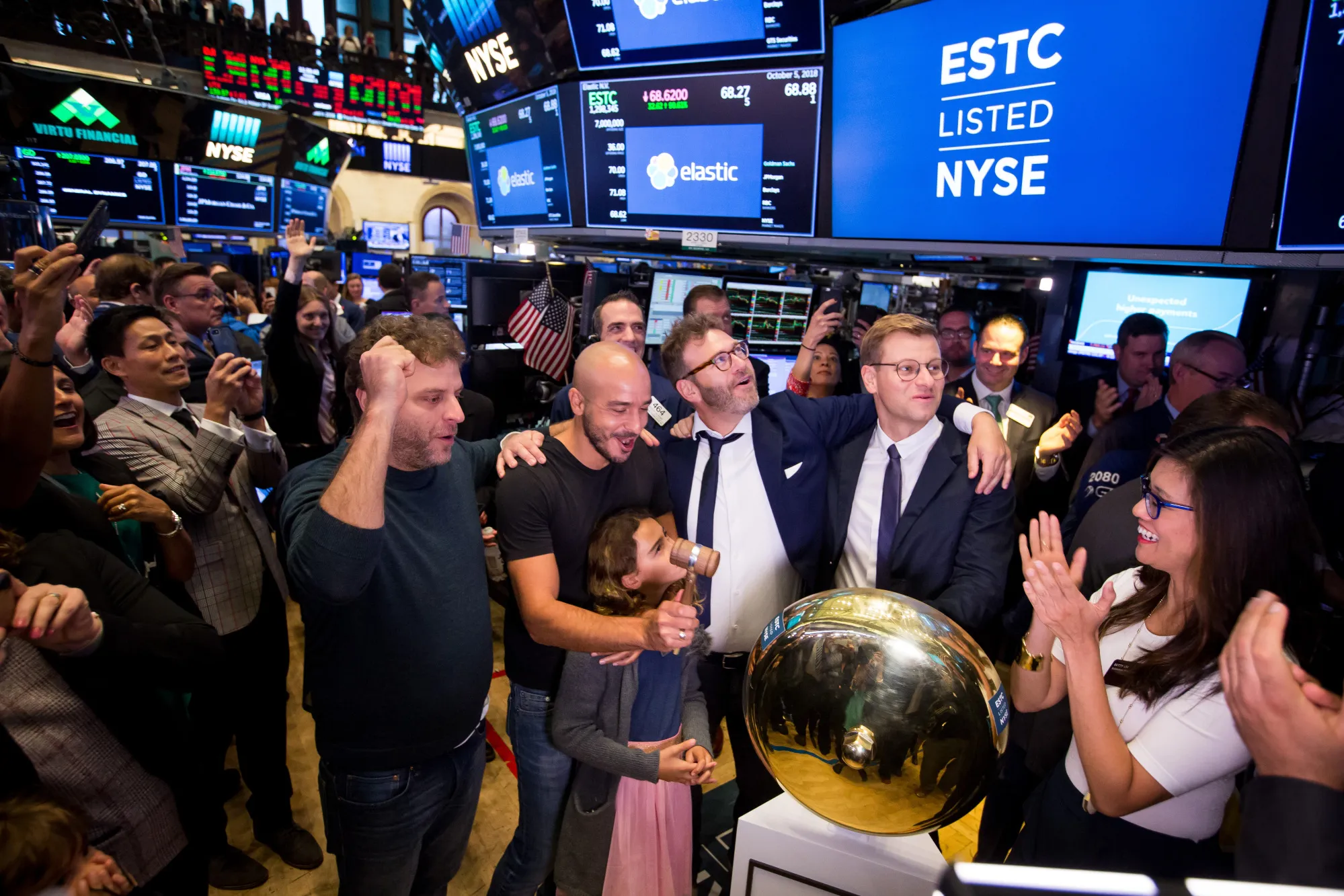 Uri Boness, co-founder of Elastic N.V., from left, Shay Banon, co-founder and chief executive officer of Elastic N.V., Steven Schuurman, co-founder of Elastic N.V., and Simon Willnauer, co-founder of Elastic N.V., ring a ceremonial bell during the company's initial public offering&nbsp;at the New York Stock Exchange in New York.