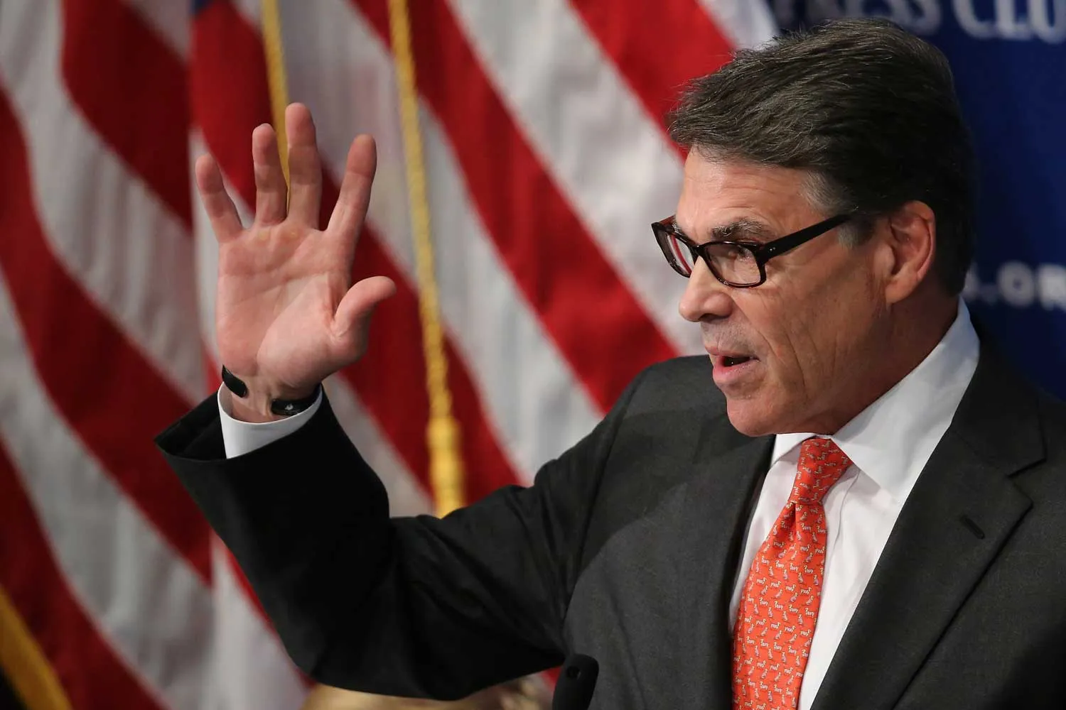Former Texas Governor and Republican presidential candidate Rick Perry addresses the National Press Club Luncheon July 2, 2015 in Washington, DC. Perry began his speech about how African-Americans should support him and the GOP by recounting the racially-motivated 1916 lynching of Jesse Washington in Waco, Texas, and how far Texas and the nation had come since that time.
