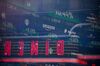 A monitor displays stock market information outside the Nasdaq MarketSite in the Times Square neighborhood of New York, U.S., on Friday, March 15, 2019. U.S. stocks joined a global advance in equities sparked by China's renewed commitment to stimulus as investors grew more confident that central banks will remain accommodative.