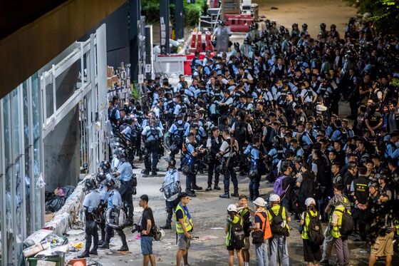 Chinese State Media Seizes on Hong Kong Chaos, Defends Police