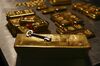 A safety deposit box key rests on a gold bar weighing 12.5 kilograms in the precious metals vault at Pro Aurum KG in Munich, Germany, on Wednesday, July 10, 2019. Gold rose for a third day after the Federal Reserve indicated that it’s preparing to cut interest rates for the first time in a decade as the global economy slows.