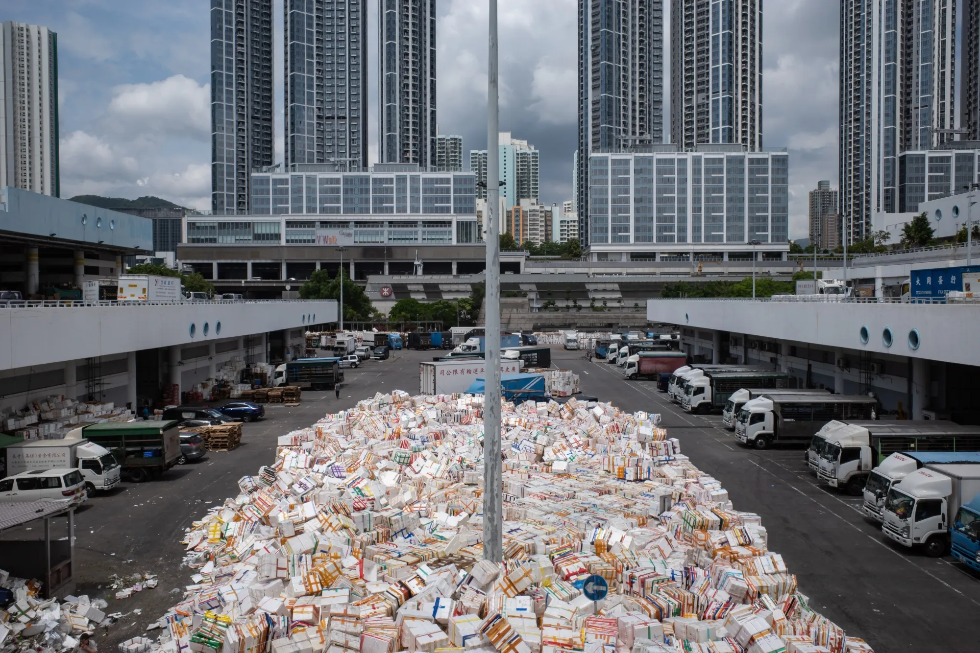 Empty styrofoam containers at a parking lot of a wholesale food market in Hong Kong on April 25.