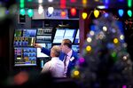 Traders work on the floor of the New York Stock Exchange (NYSE) in New York, U.S..