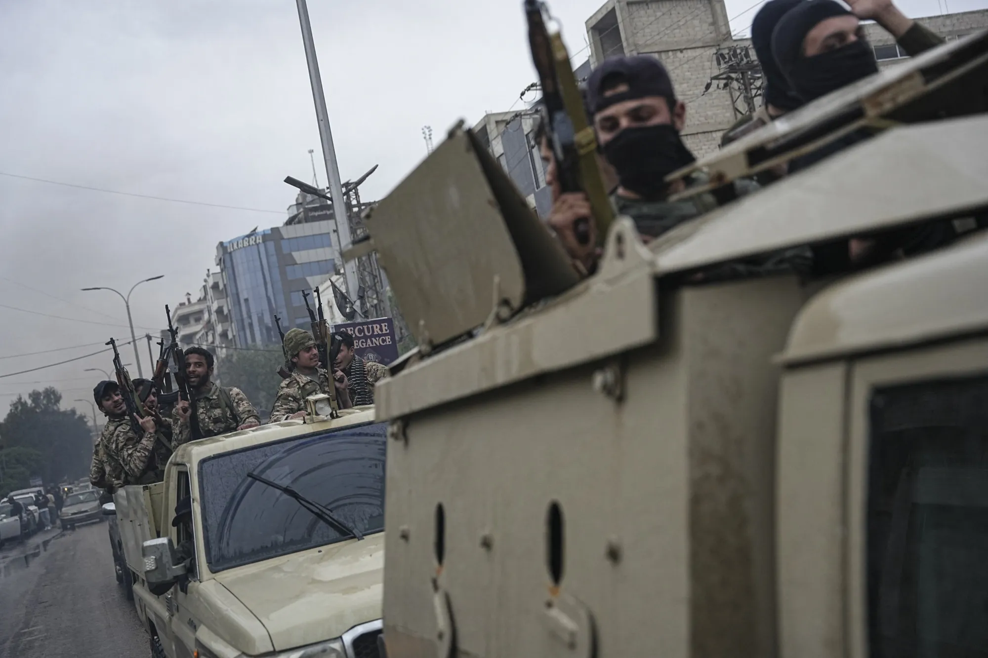 Armed Syrian government forces&nbsp; in Sahnaya, Syria, on April 30.