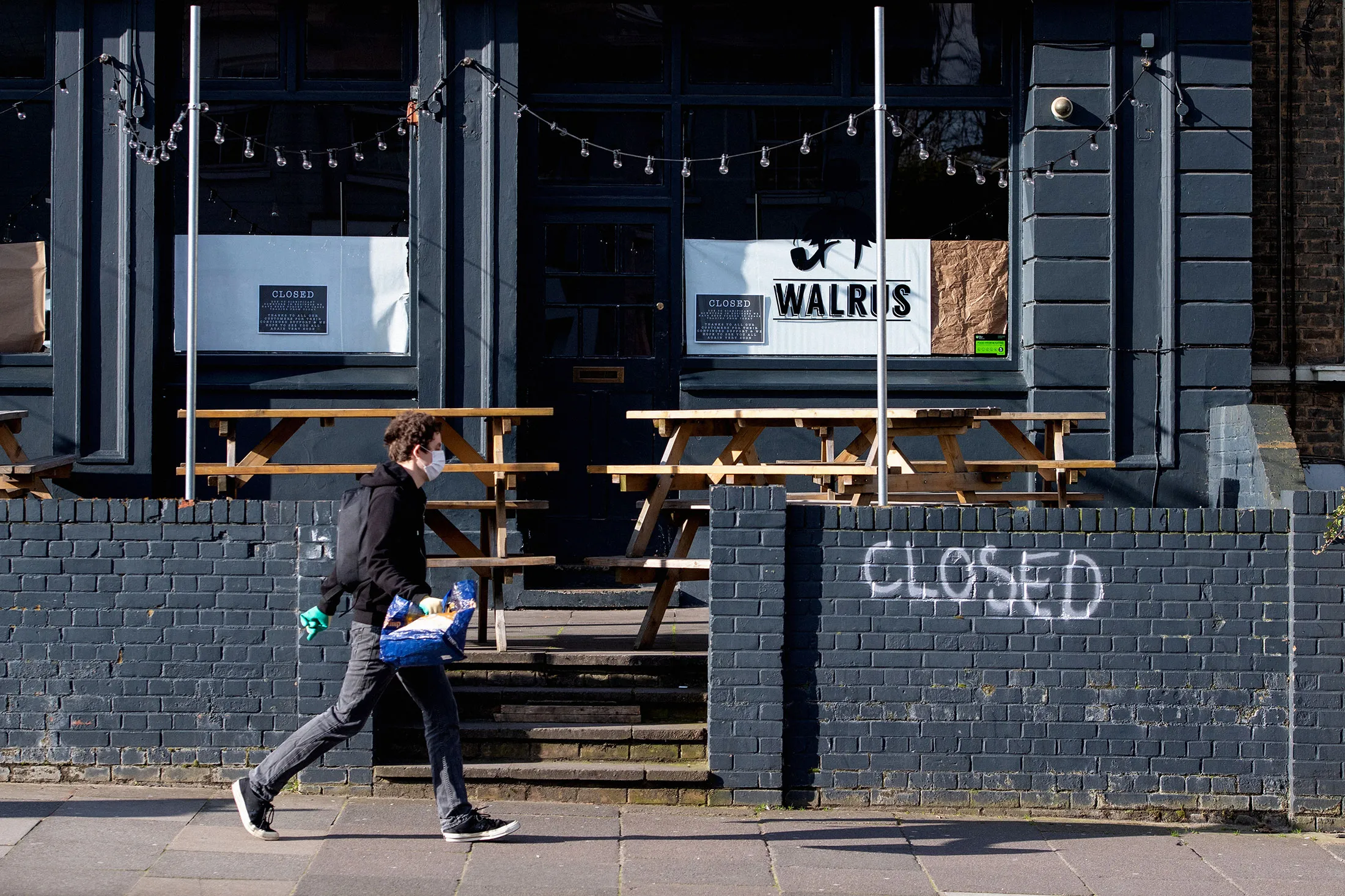 A closed pub in New Cross, south London, after the government ordered the closure of bars, clubs, and restaurants because of the coronavirus outbreak.