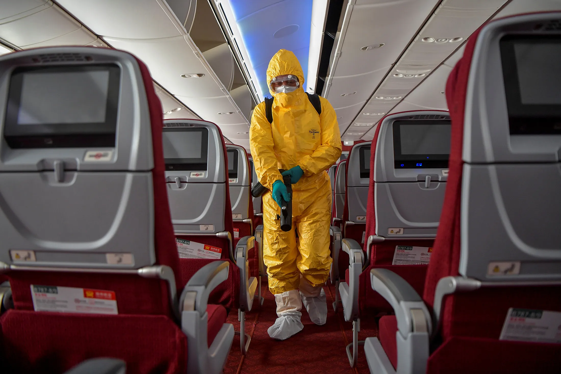 Disinfecting a Hainan Airlines flight.