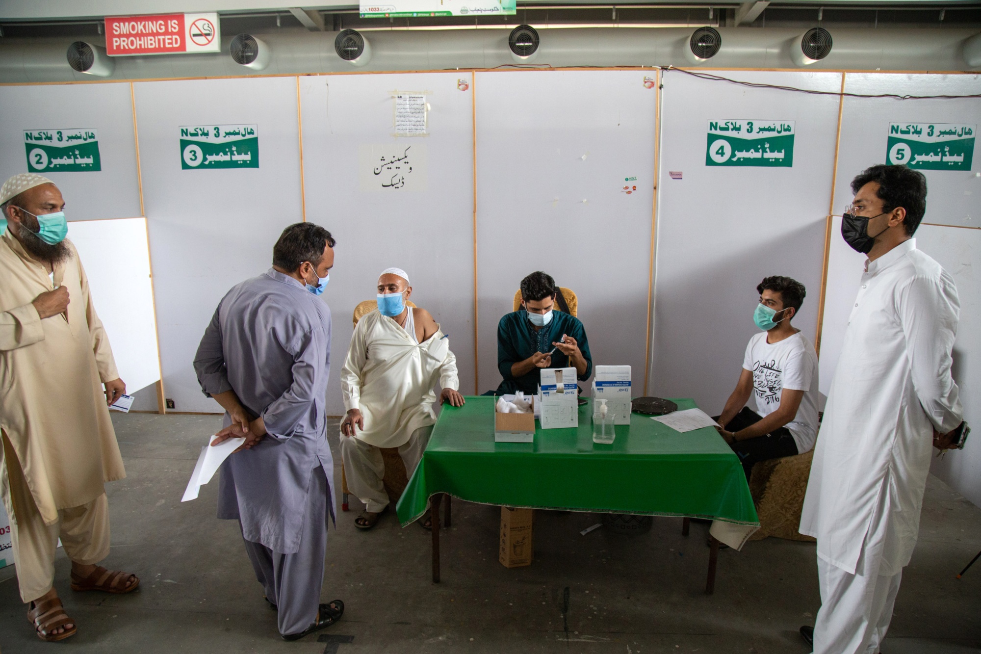 A health worker prepares to administer a dose of the Sinovac Biotech Ltd Covid-19 vaccine in Lahore, Pakistan, earlier in June.