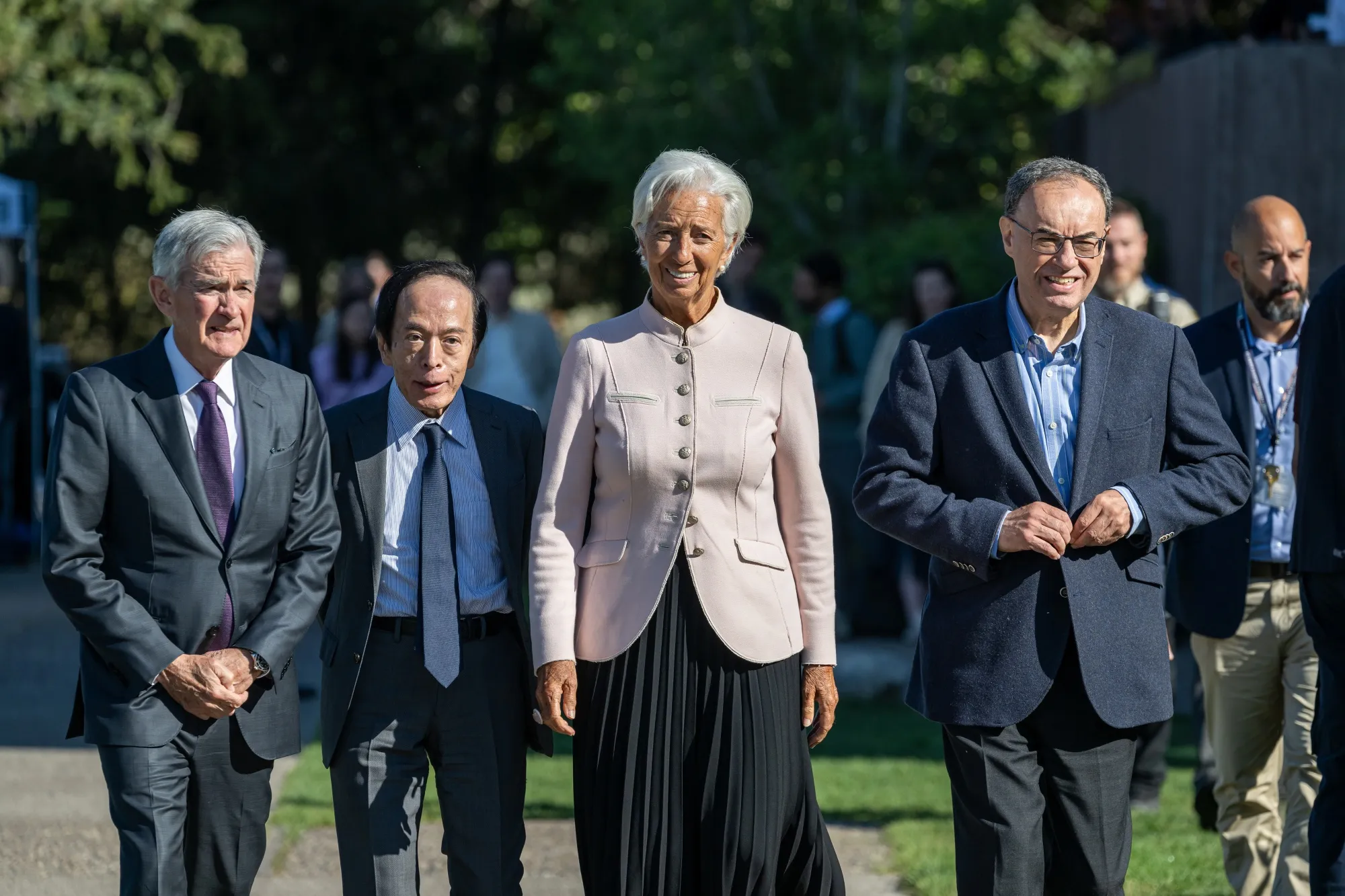 Christine Lagarde, center, walks with Fed Chair Jerome Powell, from left, Bank of Japan Governor Kazuo Ueda, and Bank of England Governor Andrew Bailey outside the Fed’s Jackson Hole Economic Policy Symposium on Aug. 22.