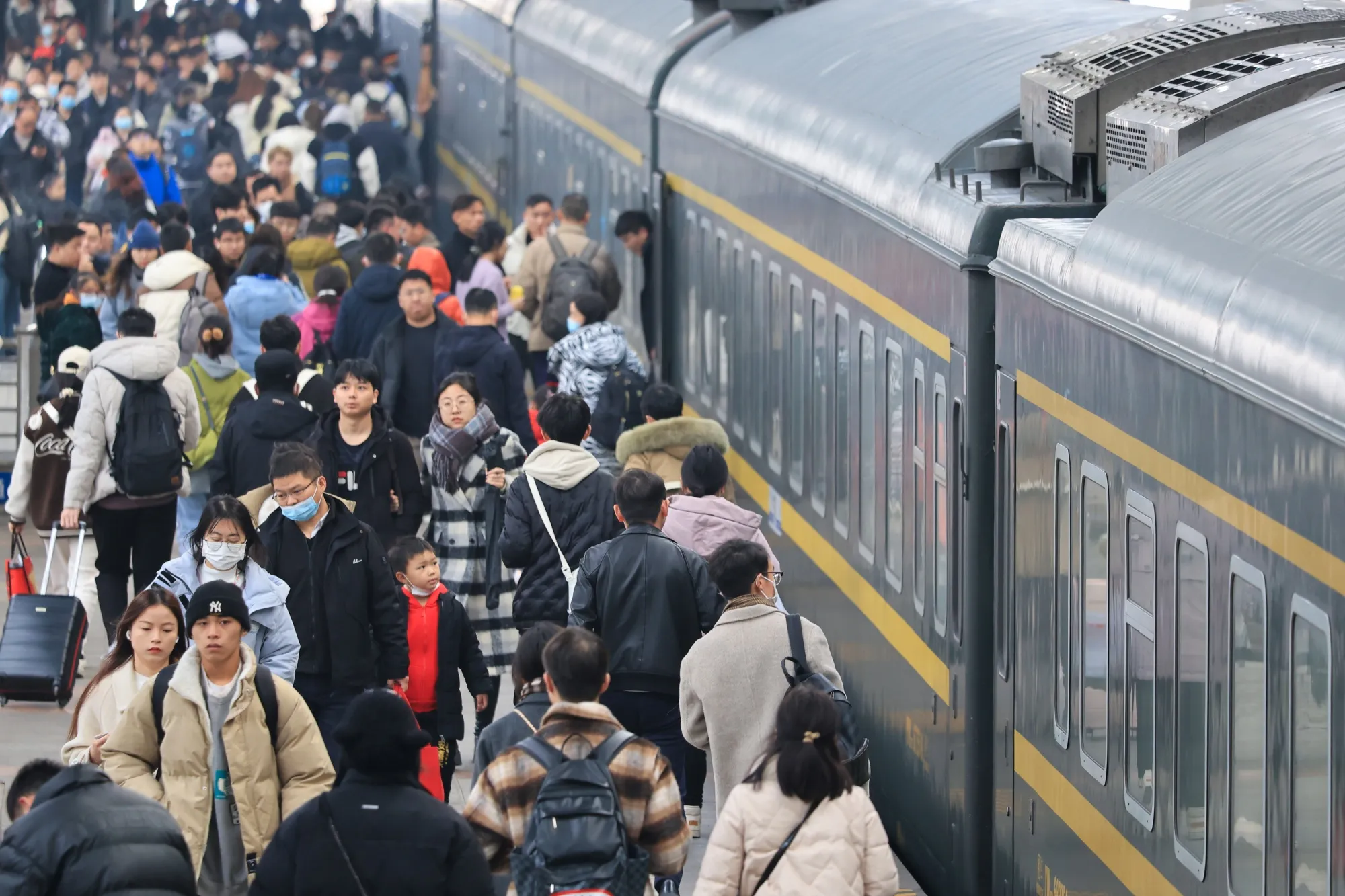 Passengers walk on the platform at Nanjing Railway Station&nbsp;in Nanjing,&nbsp;China on Jan. 1.&nbsp;