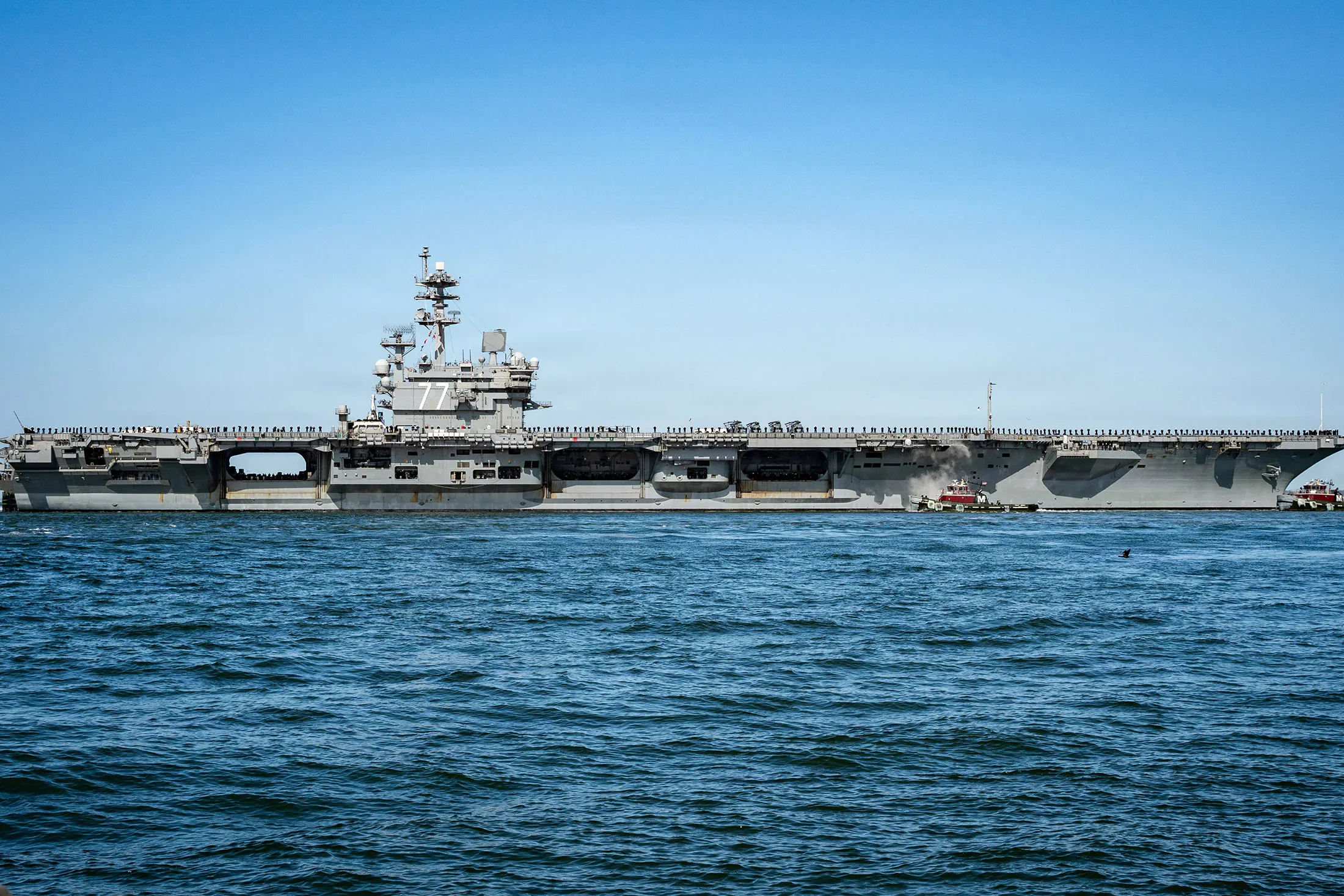 The USS George H.W. Bush departs Naval Station Norfolk, in this photograph released by the US Navy via DVIDS on March 31.