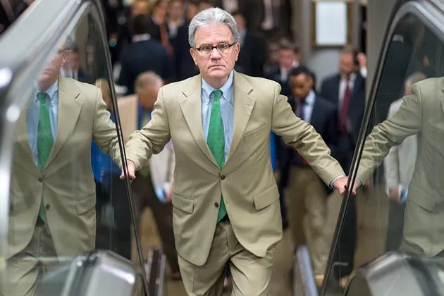 Coburn riding an escalator at the Capitol building