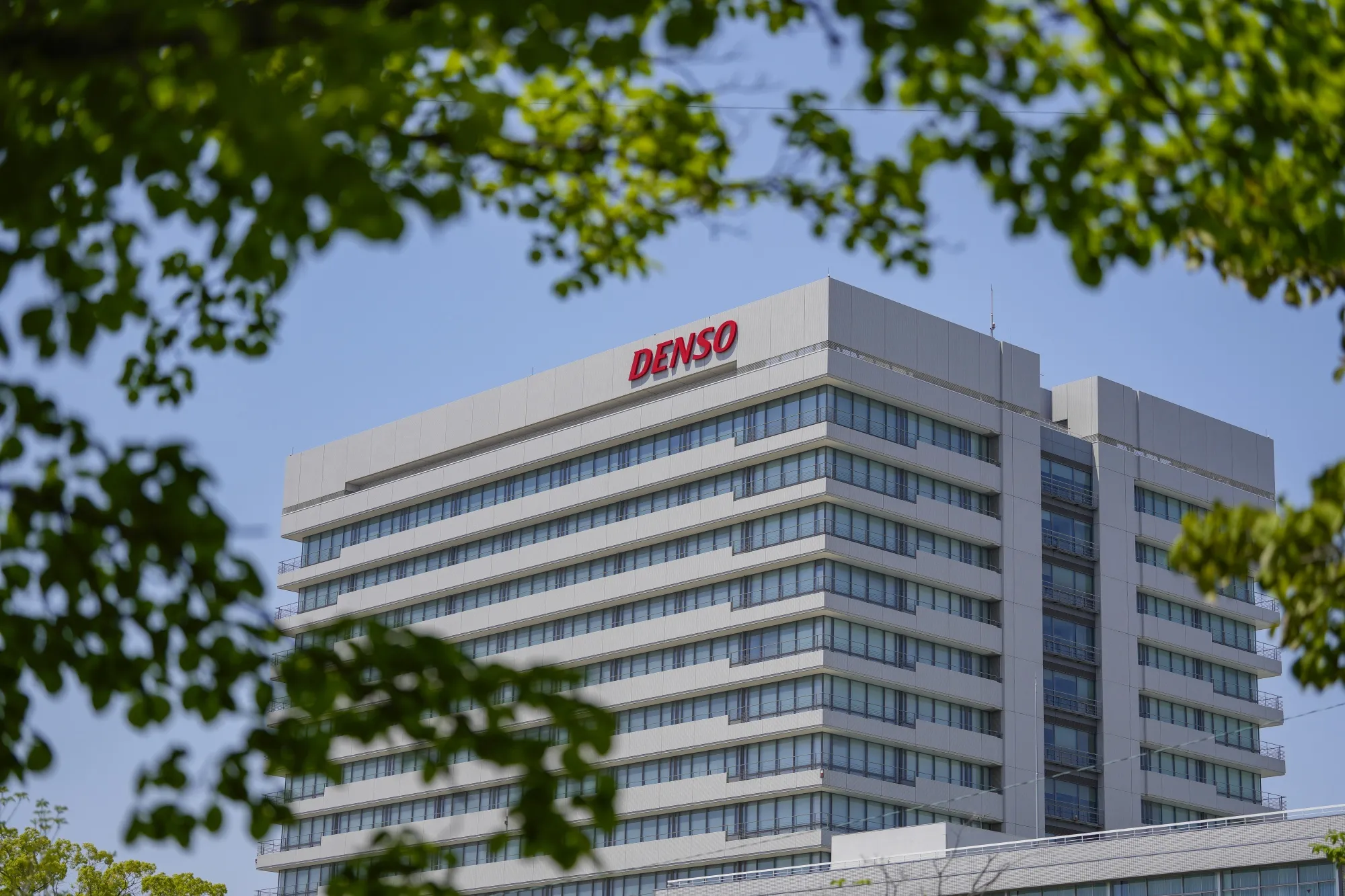 The Denso Corp. headquarters in Kariya, Aichi Prefecture, Japan, on Wednesday, April 30, 2025. Denso is in talks for cost sharing on some raw car materials with suppliers and customers including Toyota Motor Corp. to mitigate US tariff measures.