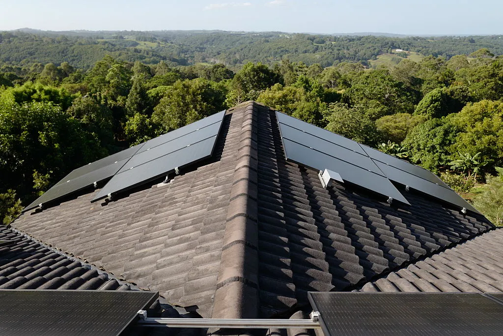 Solar panels attached on a roof of a home in Byron Bay, Australia.