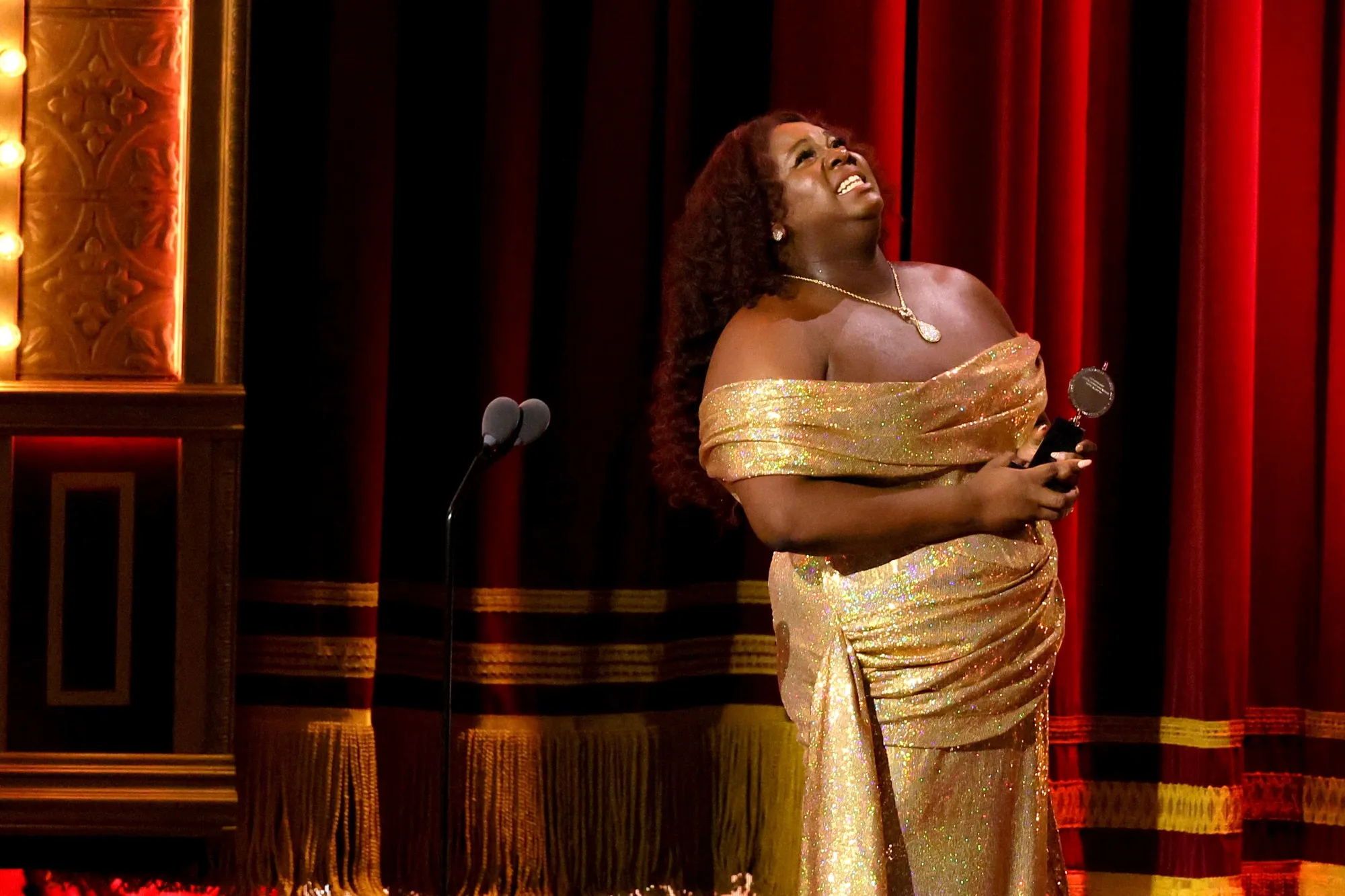 Alex Newell accepts the award for Best Featured Actor in a Musical for “Shucked” during The 76th Annual Tony Awards on June 11.