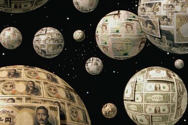 Globes covered with various currencies suspended in space