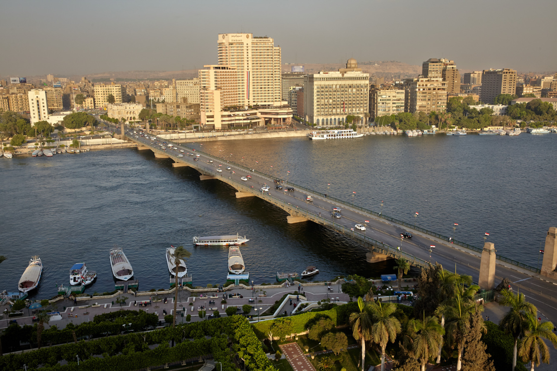Traffic drives along a bridge spanning the river Nile, in Cairo, Egypt, on Friday, Aug. 7, 2015.