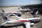 Malaysia Airlines planes on the tarmac at Kuala Lumpur International Airport