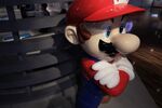 A statue of Nintendo Co.'s video-game character Mario stands on display at the Nintendo Game Front showroom in Tokyo.
