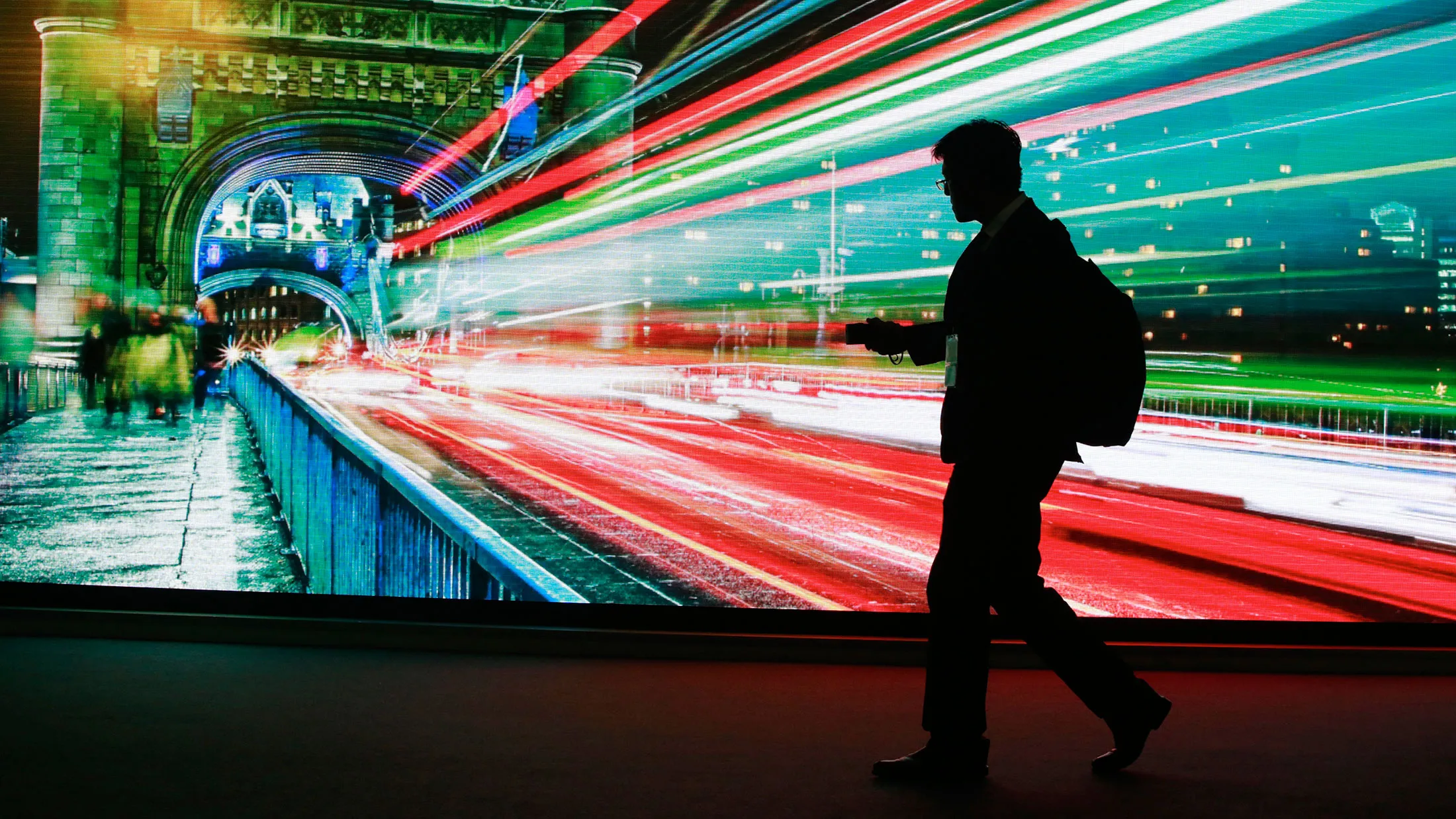 A video display showing Tower Bridge in London.

