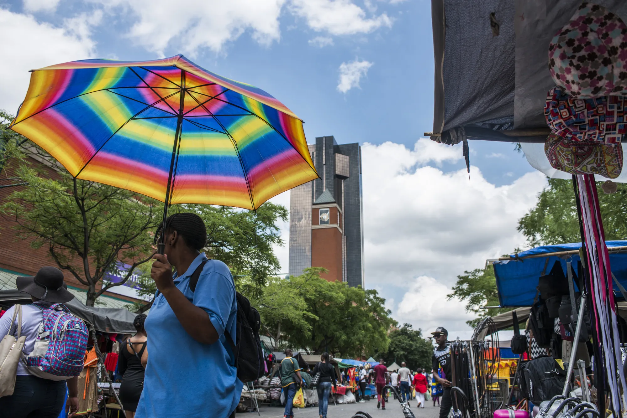 A pedestrian passes near the headquarters of the South African Reserve Bank.
