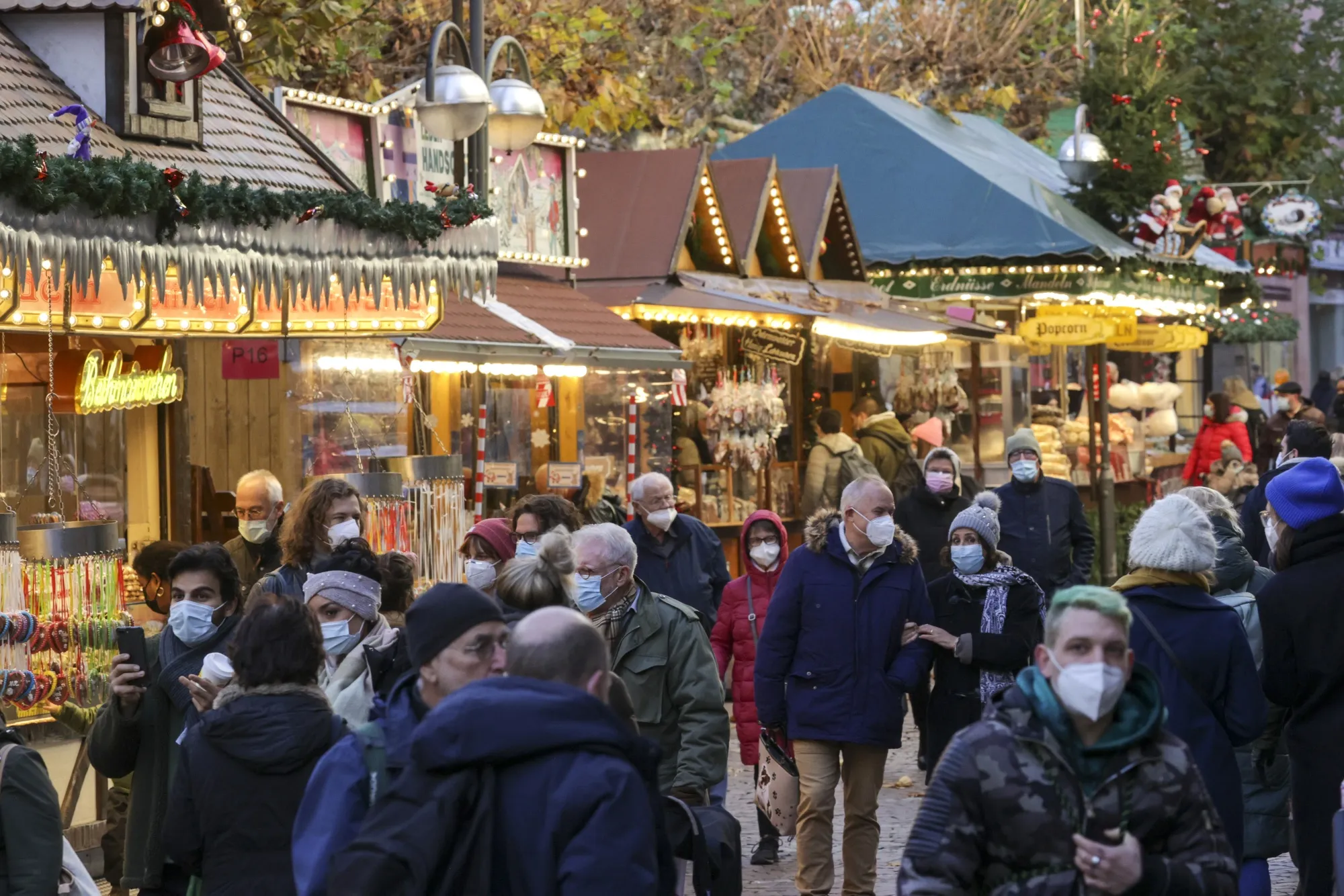 Visitors at a Christmas market in Frankfurt, Germany.