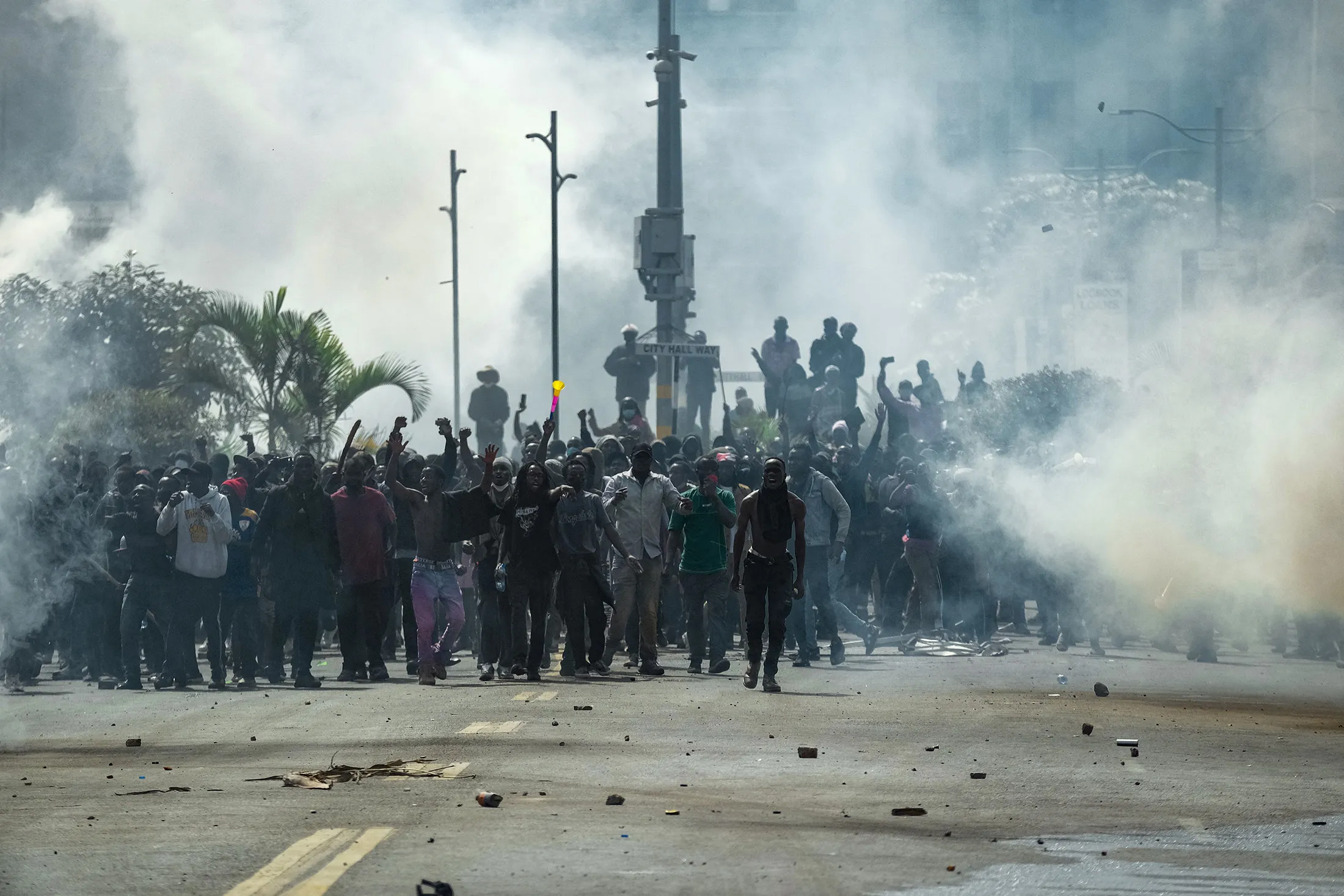 Demonstrators protest against tax hikes&nbsp;amid clouds of tear gas&nbsp;in&nbsp;Nairobi, in June,&nbsp;2024.