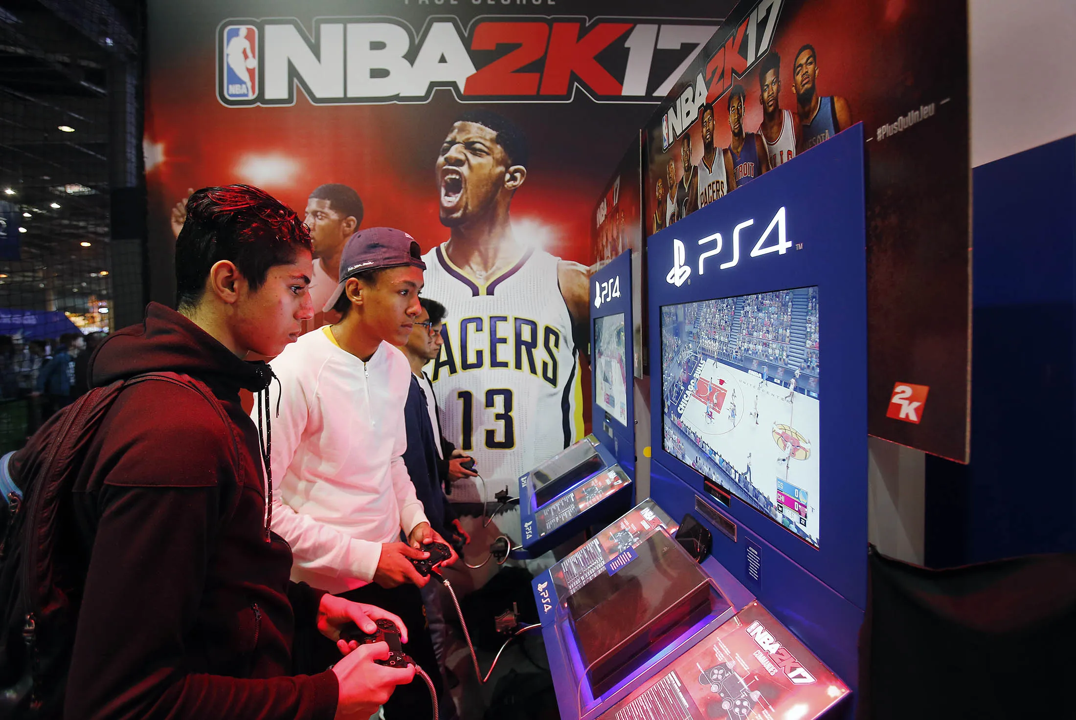 Gamers play the NBA 2K17 video game.
