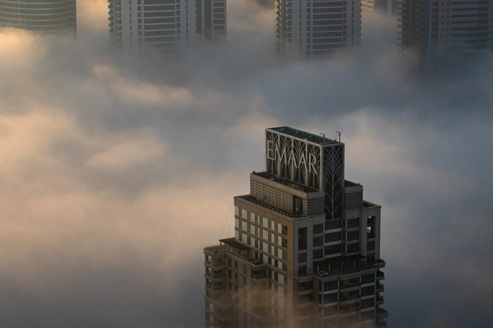Morning fog in the Dubai Marina district of Dubai.
