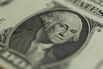 George Washington appears on the front of a US one dollar bi