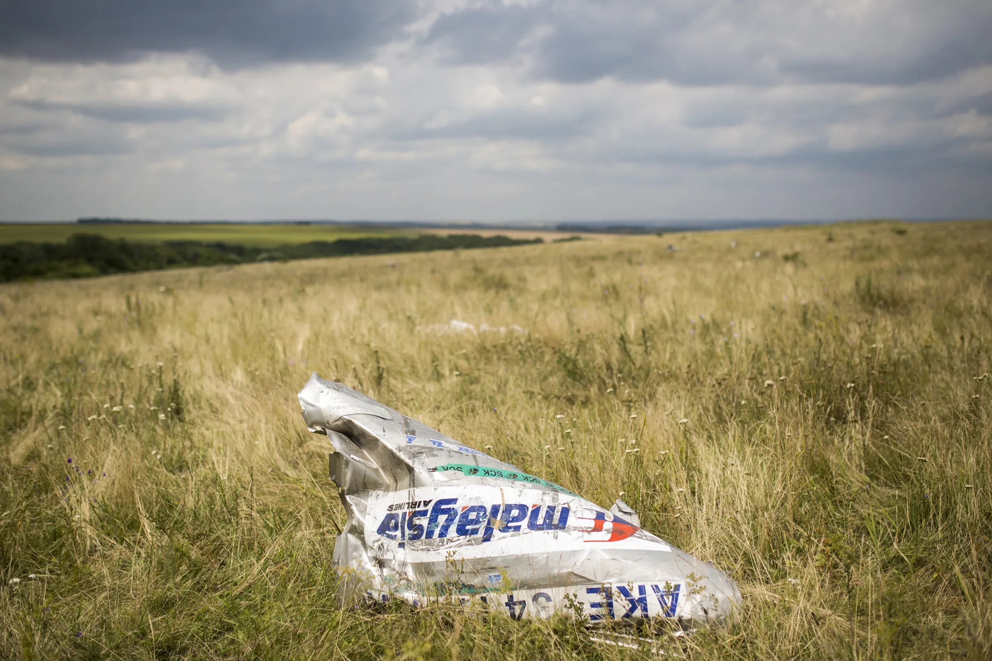 Wreckage from Malaysia Airlines flight MH17 lies in a field in Grabovo, Ukraine, on July 22, 2014.
